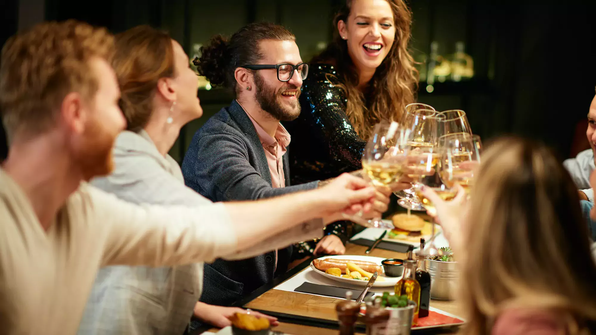 group of adults at dinner