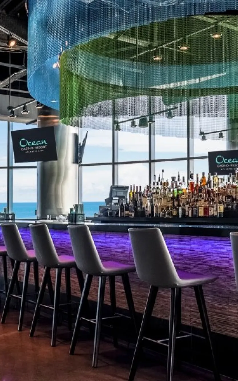 Bar with oceanfront views at Ocean Casino Resort, perfect for enjoying drinks while watching pro football games.