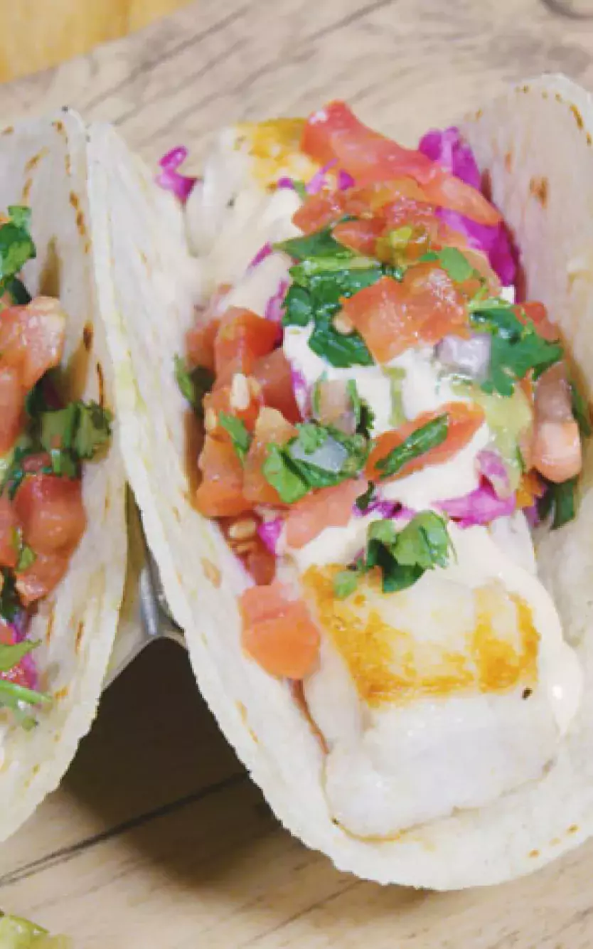 Various plated tacos at Distrito restaurant