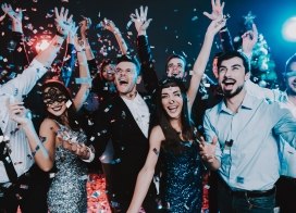group of young adults celebrating a holiday party
